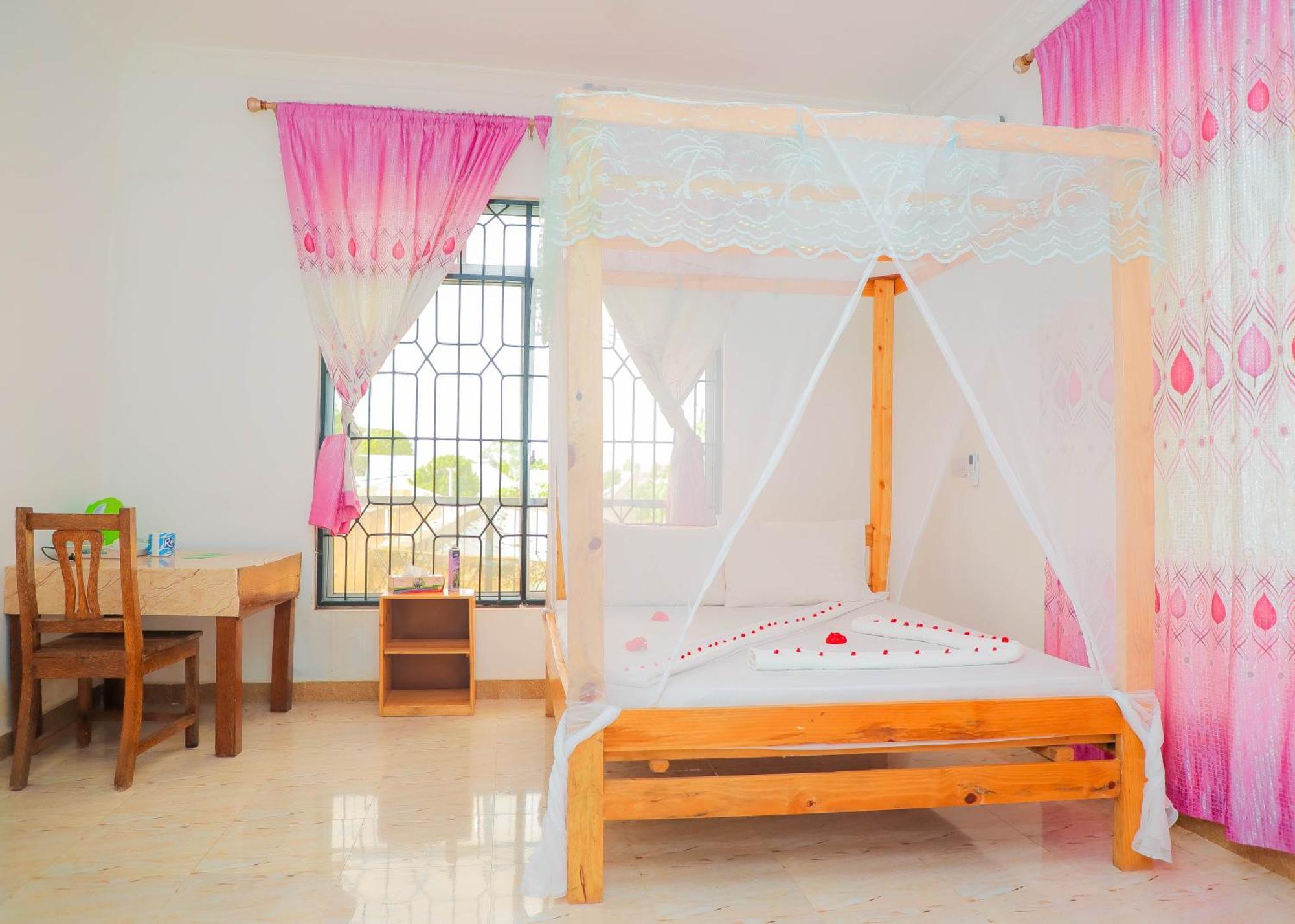 Bed and Breakfast Raha House Нунгви Экстерьер фото