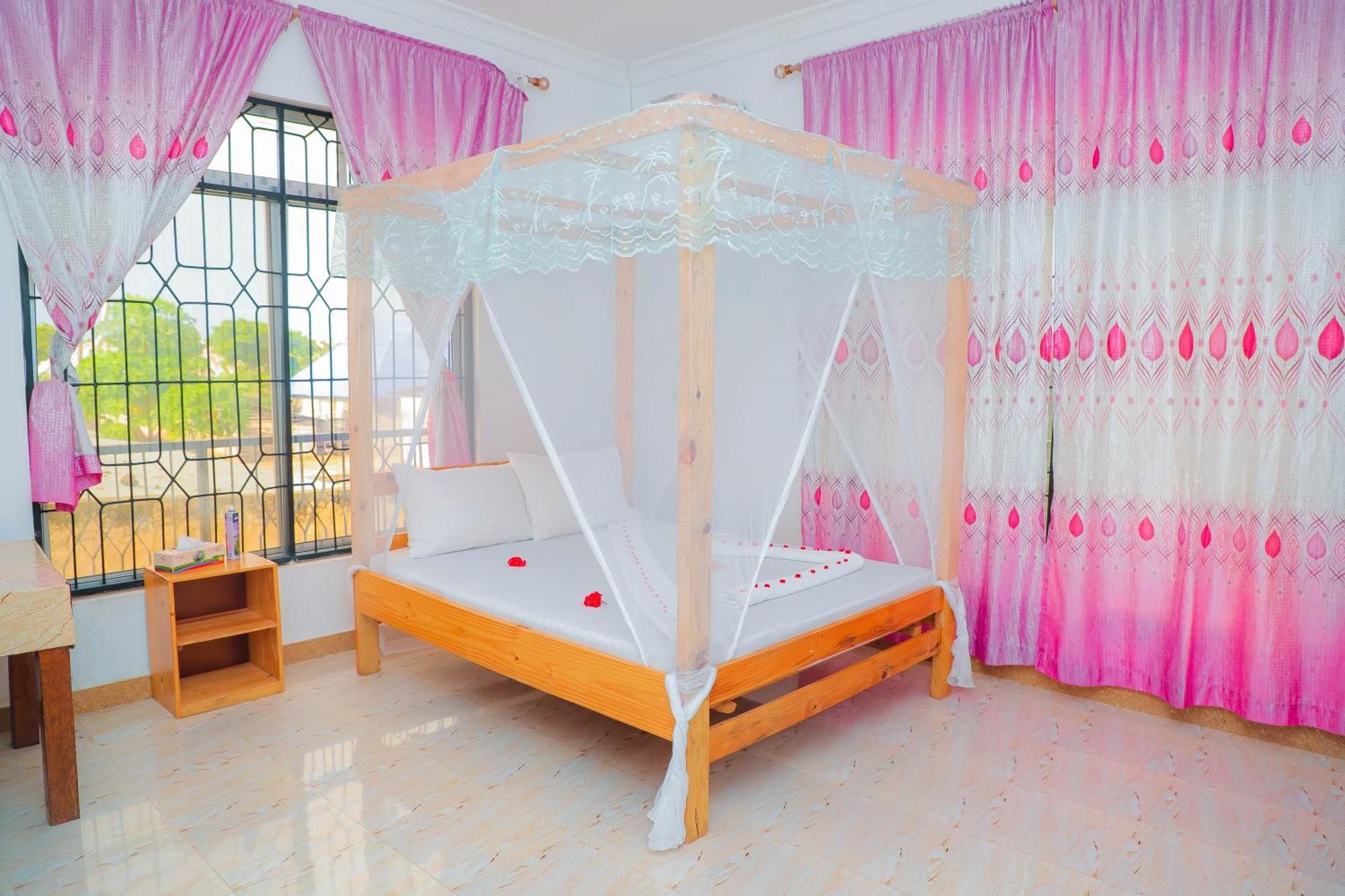 Bed and Breakfast Raha House Нунгви Экстерьер фото